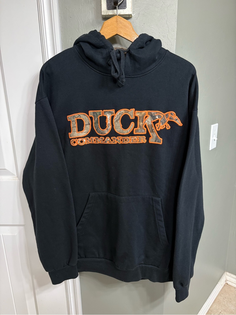 Black Hoodie with Orange Logo